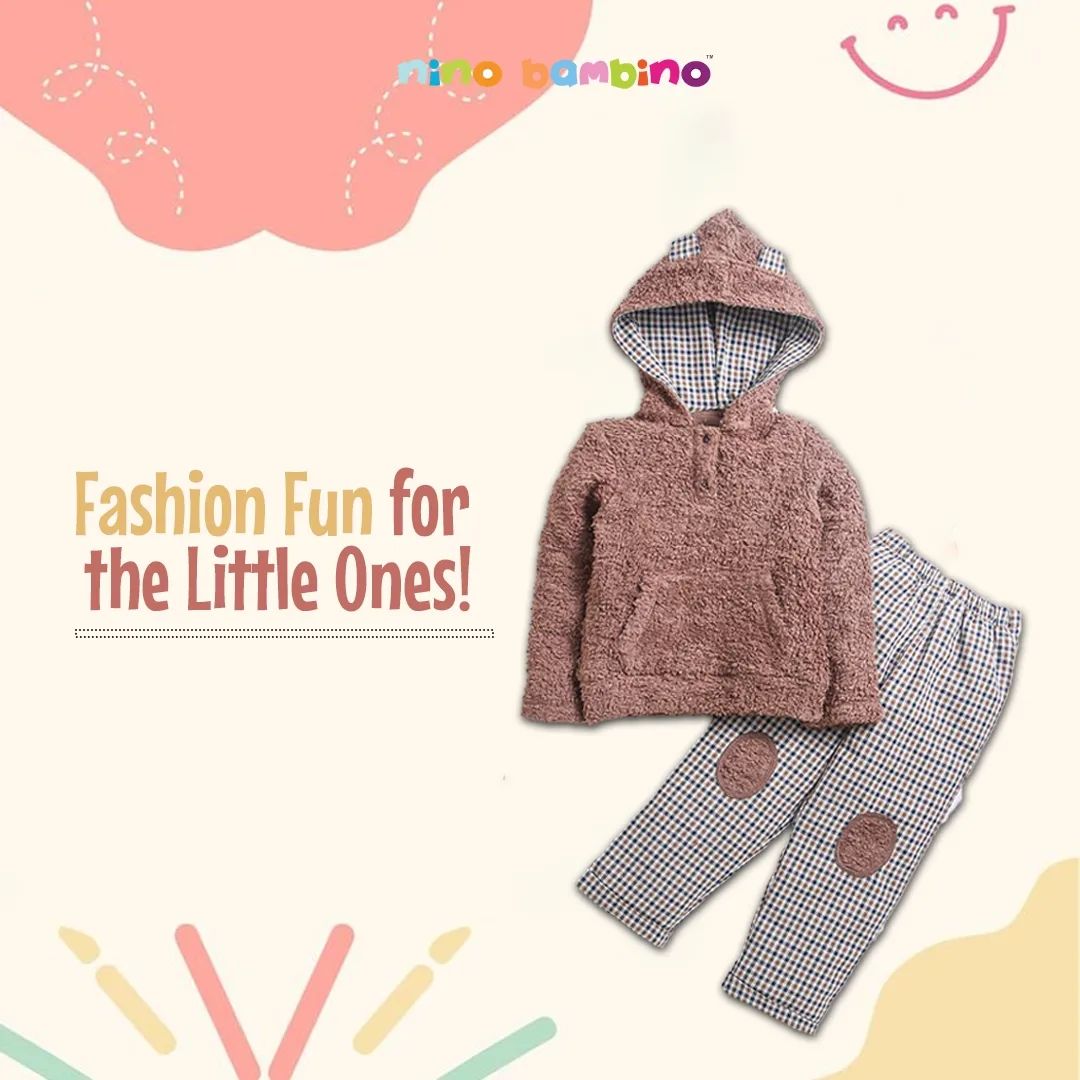 Celebrating Tiny Triumphs: Nino Bambino Baby Outfits for Milestone Moments.